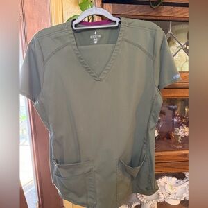 Olive scrubs by med couture top is large and pants medium, like new